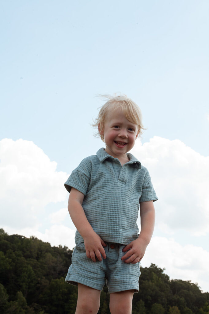 Toddler looking at camera during easygoing family session in Atlanta, GA